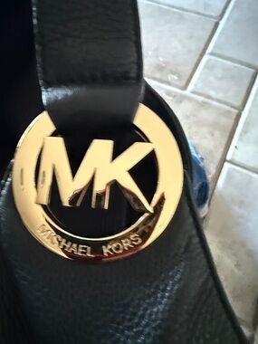 Michael Kors Black Pebbled Leather Hobo with Gold MK Charm